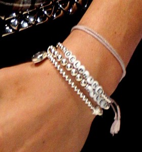 sarah connor_silver name bracelets close up