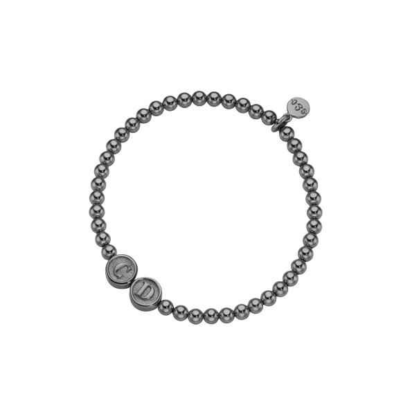 Schwarzplattiertes Kugelarmband von strawberry & cream mit Initialen CD freigestellt liegend